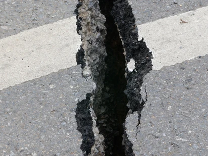 Road cracked from earthquake activity