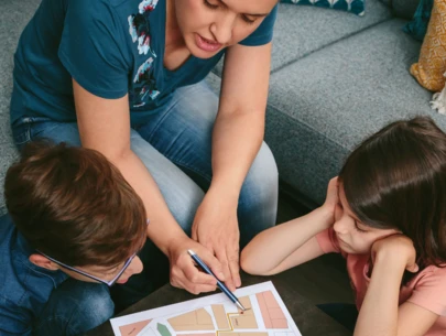 Mom shows kids evacuation plan.