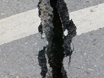 Road cracked from earthquake activity