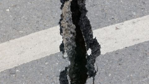 Road cracked from earthquake activity